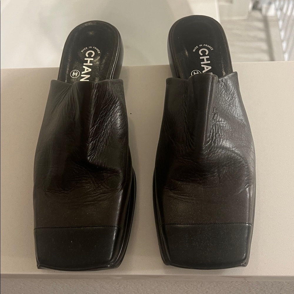 CHANEL Dark Brown Leather Slip-On Shoes with Black Toe Detail size 41